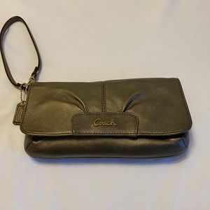 COACH metallic wristlet